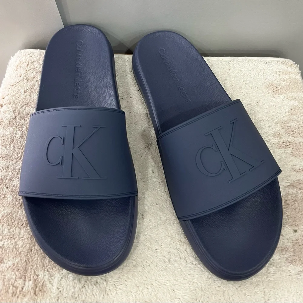 Calvin Klein Medium Gray Embossed CK‎ Slide Sandals